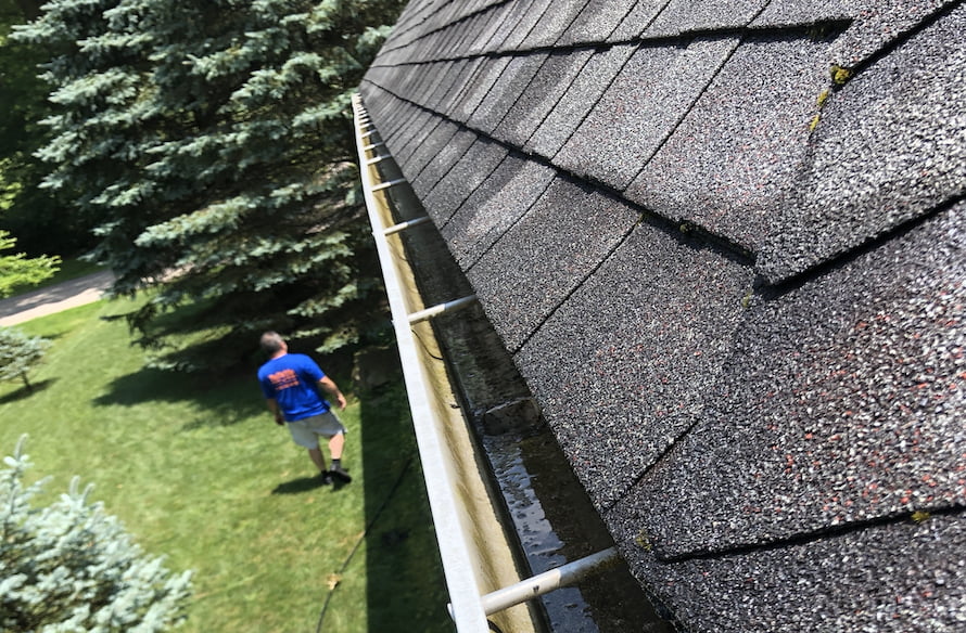 Commercial gutter overflow on large building